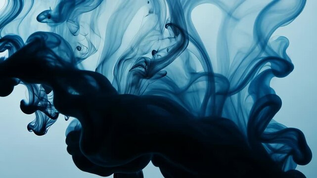 A drop of water is falling into a body of water. The water is dark blue and the drop is small