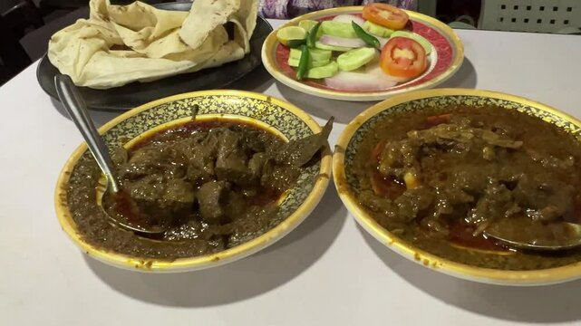 Mutton kaleji and mutton chap served with rumali roti in a dhaba in Kolkata, India