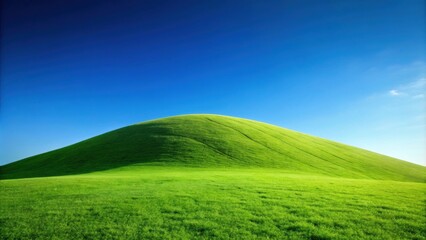 Fototapeta premium Green hill with clear blue sky in background, nature, landscape, hill, grass, meadow, field, foliage, isolated
