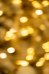 A blurry image of gold and white with a lot of circles