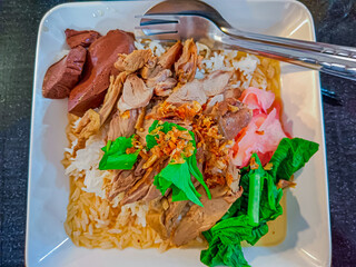 Rice with roasted duck, another popular Thai dish for street food.