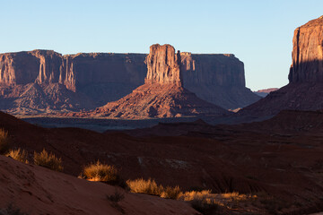 Monument Valley Rock Formations, Arizona-Utah Border, USA – Iconic Desert Landscapes with Majestic Buttes and Mesas,  Captured in Breathtaking Sunset Light