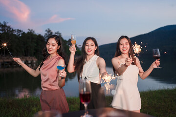 Asian women celebrate, meet and talk in bars. Tourist attractions, beautiful lights