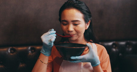 Food, eating and Asian woman in restaurant to taste dinner, supper and lunch in cooking class....