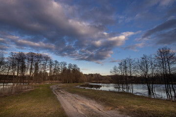 Road with a body of water in front of it