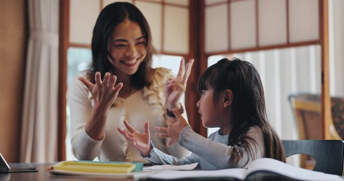 Homework, counting and Asian mom with child in home for maths lesson, learning and teaching. Japanese family, education and mom with girl for help with numbers, studying and school development