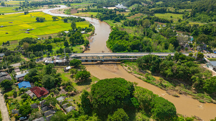 Aerial view of The Ta Pai Memorial Bridge is like the gateway to Pai. It is a bridge with a dark...