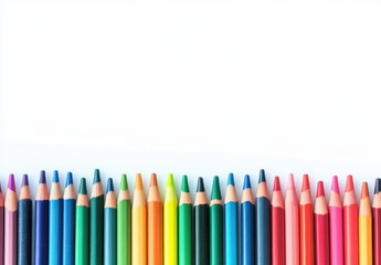 Colorful pencils arranged neatly on white background, perfect for art projects and creativity. Ideal for schools, offices, and artistic endeavors