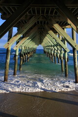 underneath the pier on the beach