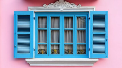 Fototapeta premium A charming blue window with shutters on a pink wall