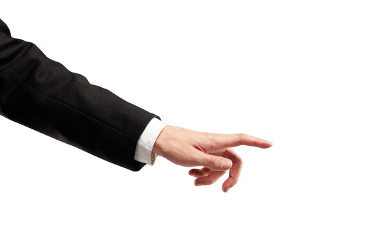 Closeup of a hand in a business suit pointing on a white background. Isolated, minimalistic style. Concept of direction, gesture, or interaction