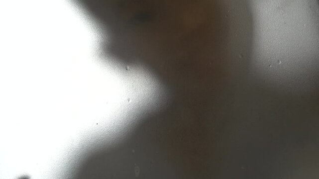 Ghost hand on the bathroom mirror