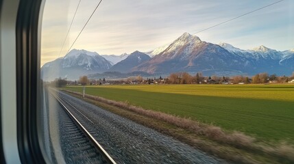 Scenic railway journey through Switzerland, with mountain views from the window