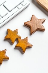 Four wooden stars on a white surface.