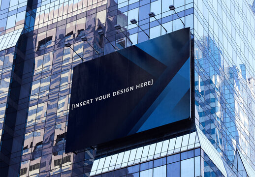 Billboard on a Reflective Skyscraper in New York City. PSD Mockup Template
