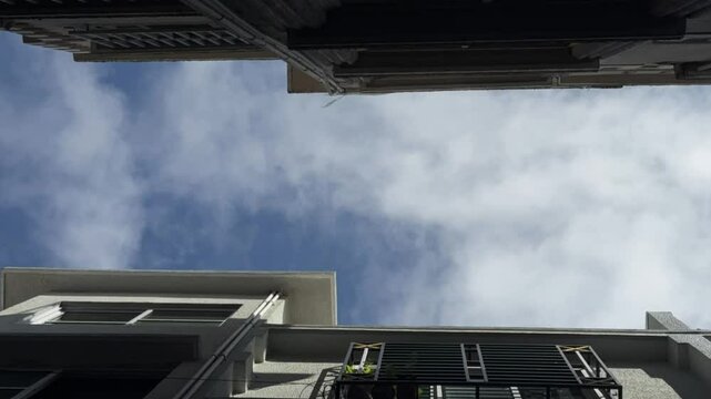 Clouds Timelapse on Middle of Building