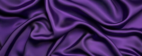 Fototapeta premium Luxurious purple silk fabric draped elegantly, showcasing its smooth texture and rich color, perfect for backgrounds or textile design.