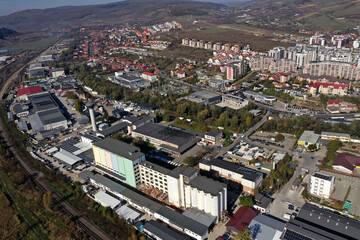 Factories in suburban industrial area aerial view