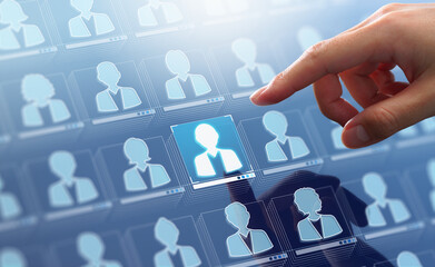 Customer relationship management CRM concept. Customer data and marketing database system. Businessman touching customer icon.