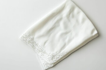 White fabric with lace trim.