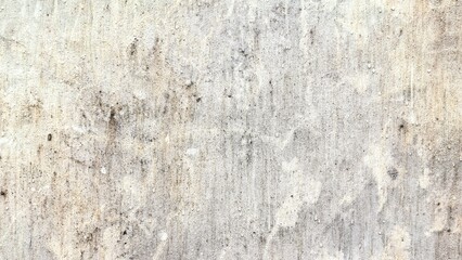 A textured, weathered concrete wall with subtle stains and marks, showcasing the natural aging process of the material.