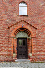 Obraz premium Door in an old red brick house in Germany