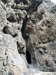 Natural rock formation with a mysterious cave entrance
