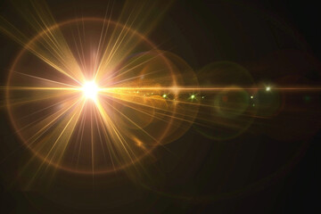 Obraz premium Bright sunlight creates stunning lens flare effect, illuminating dark background with vibrant golden rays and soft bokeh. This captivating image evokes warmth and energy