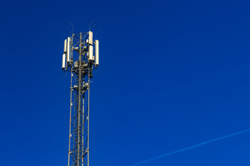 A tall mast with devices for transmitting television and mobile telephony signals in 5G technology