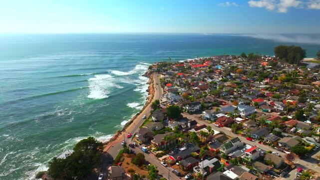 Santa Cruz Pleasure Point Park Private beach Opal Cliffs California aerial drone surfing surf waves Steamers Lane Cliff Drive walk Capitola neighborhood Monterey Bay morning mist sunny forward pan up