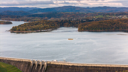 Stunning Drone Shot of Solina Lake with Fall Foliage in Bieszczady © marcin jucha
