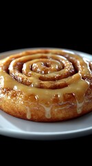 Fototapeta premium Close Up of a Delicious Glazed Cinnamon Roll