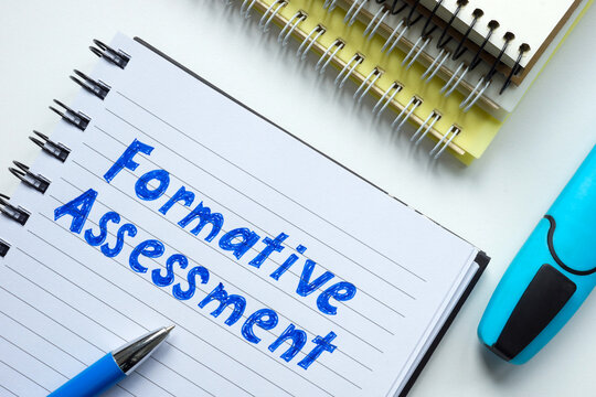Notebook with formative assessment notes. Educational progress.