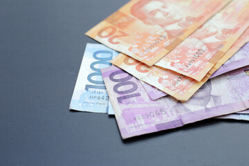 Philippine money, Banknotes on dark background.