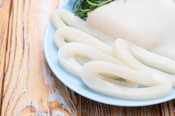 Squid tube and ring photography . Seafood top view