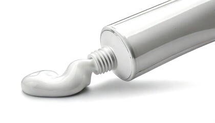 Close-up of a toothpaste tube with a small amount of paste squeezed out.