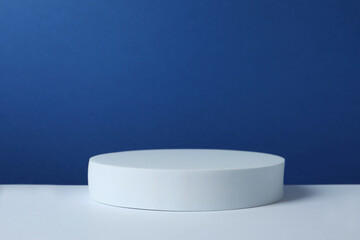 White podium on color background 