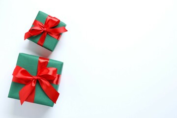 Beautiful gift boxes tied with bows on white background 