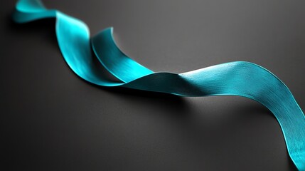 A teal ribbon on a black background.