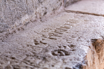 Close-up of ancient stone steps with medieval worn engravings. Bodrum Castle of St. Peter. Bodrum, Mugla, Turkey (Turkiye)