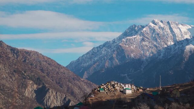 Triloknath village under the snowy Himalayan mountain peak at Lahaul and Spiti district in Himachal Pradesh, India. Beautiful village under the snowy Himalayan mountain peaks during the winter season.