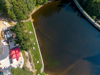 Dam on a mountain river, view from above, Karpacz, Poland.