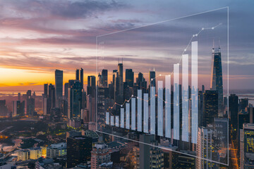 City at sunset with digital bar chart overlay, representing data against illuminated buildings.