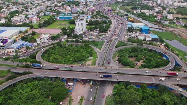 aerial view of maduravoyal bypass flyover bridge push in shot, drone, 4k, day time, in chennai, tamil nadu, india.