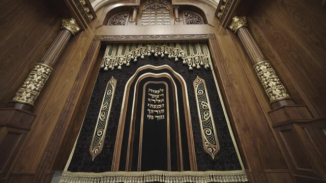 Ornate Aron Kodesh (Torah Ark) in Synagogue with Detailed Carvings and Hebrew Inscriptions