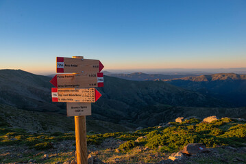 direction sign of hiking in mountain in national park Gennargentu in Sardinia at sunset