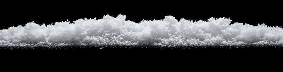 close up view of fluffy white snow against black background, creating striking contrast. texture and detail of snowflakes are highlighted beautifully