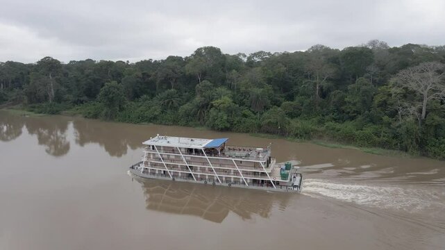 Aerial view of the cruise ship crossing the congo basin rainforest in the democratic republic of Congo.