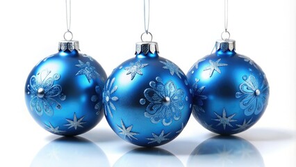 Capture the essence of the season with a breathtaking aerial shot showcasing three blue Christmas baubles against a clean white backdrop, ideal for festive decorations.