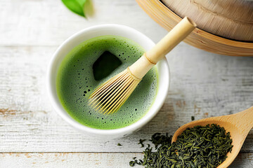 Waiter puts hot matcha tea with green foam on table. Alternative to cappuccino to reduce your caffeine intake.